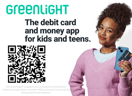 Dark skins teenage girl holding a phone and a greenlight debit card